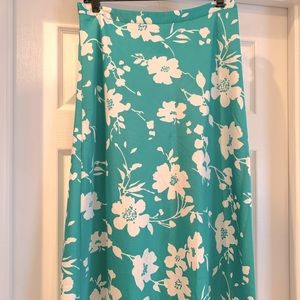 JCREW, size 6, fit + flare midi skirt with green and white floral print.